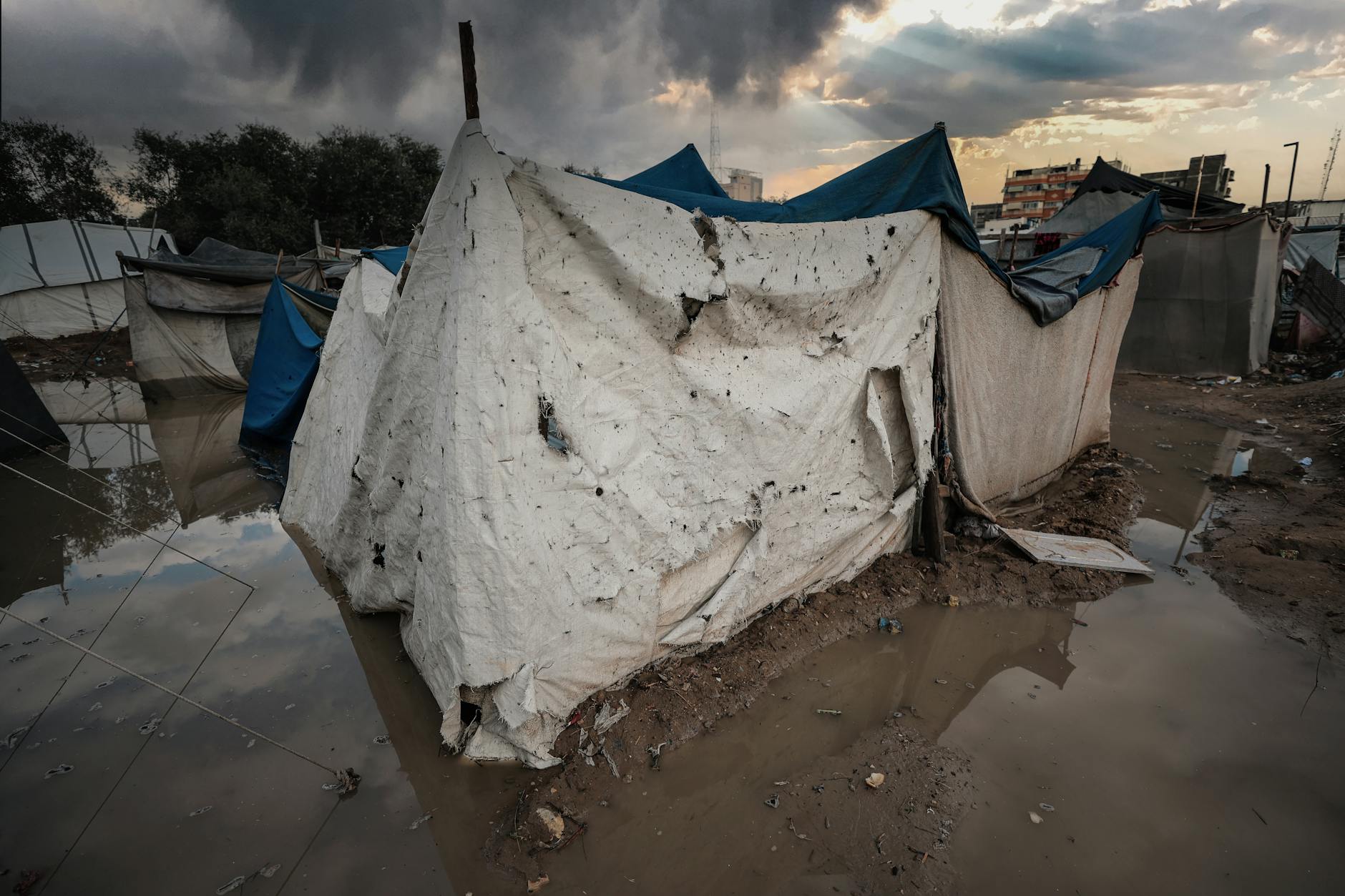 flooded tent shelter in gaza refugee camp